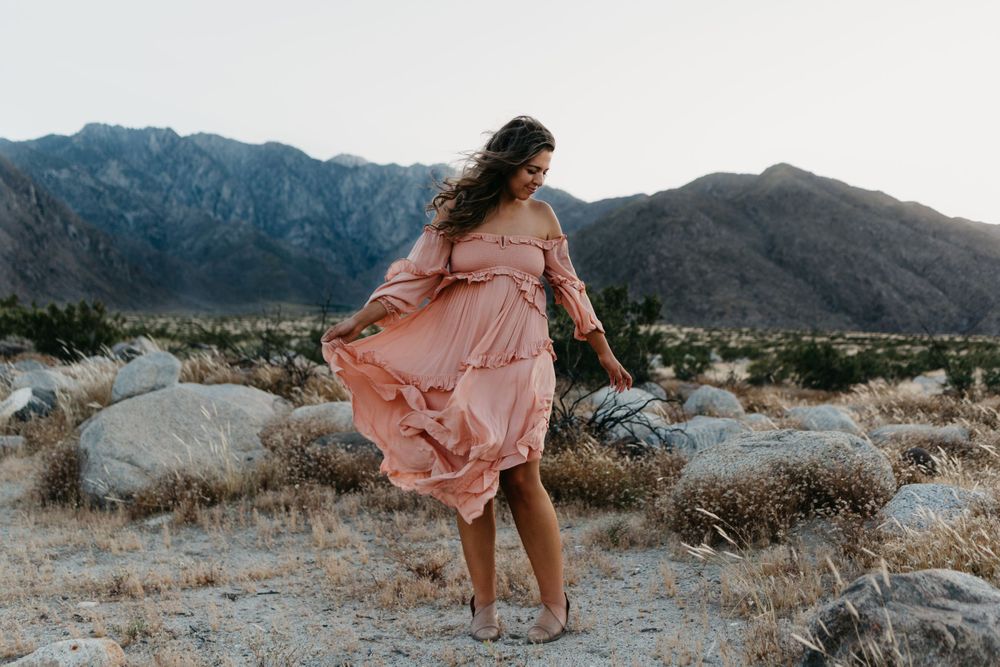 woman in pink dress in the desert palm springs california