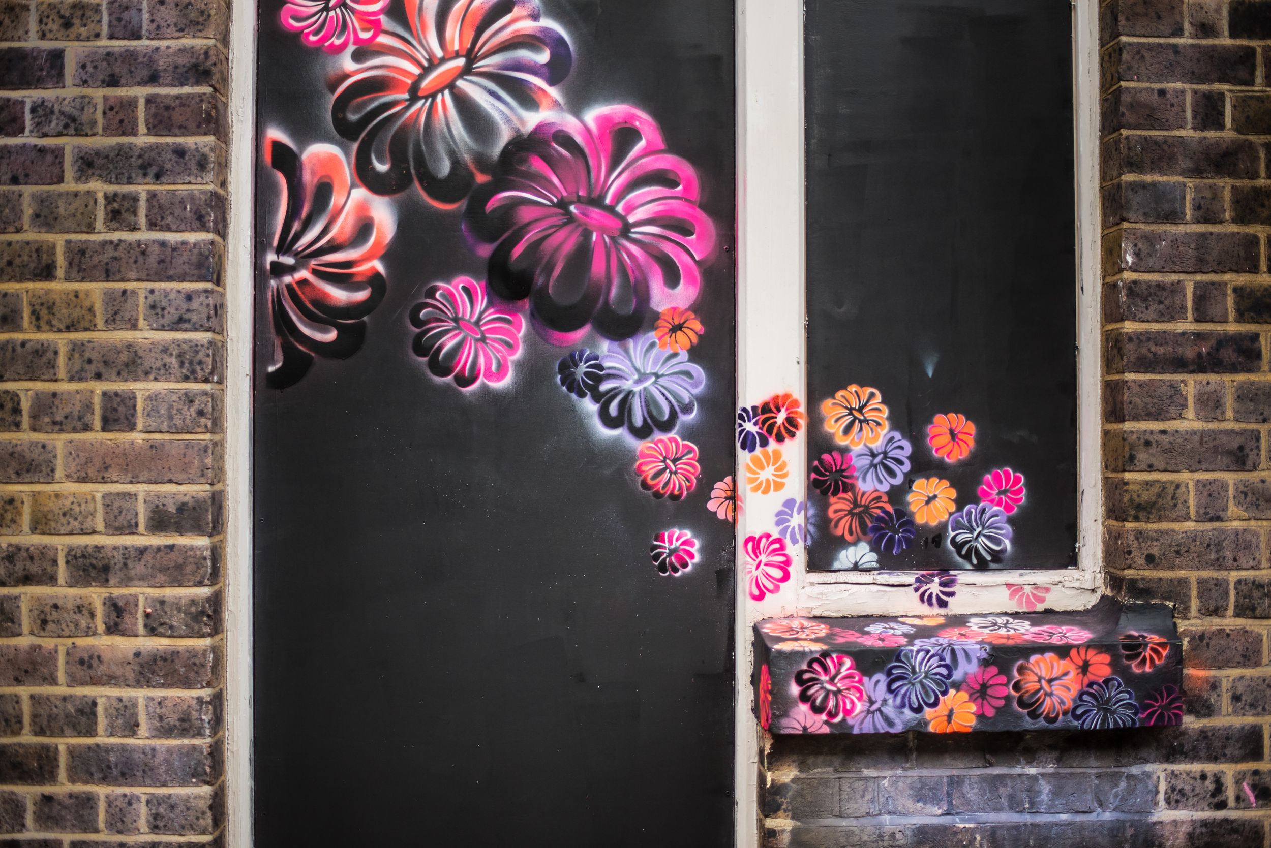 Flower power graffiti wall in London's Shoreditch neighborhood