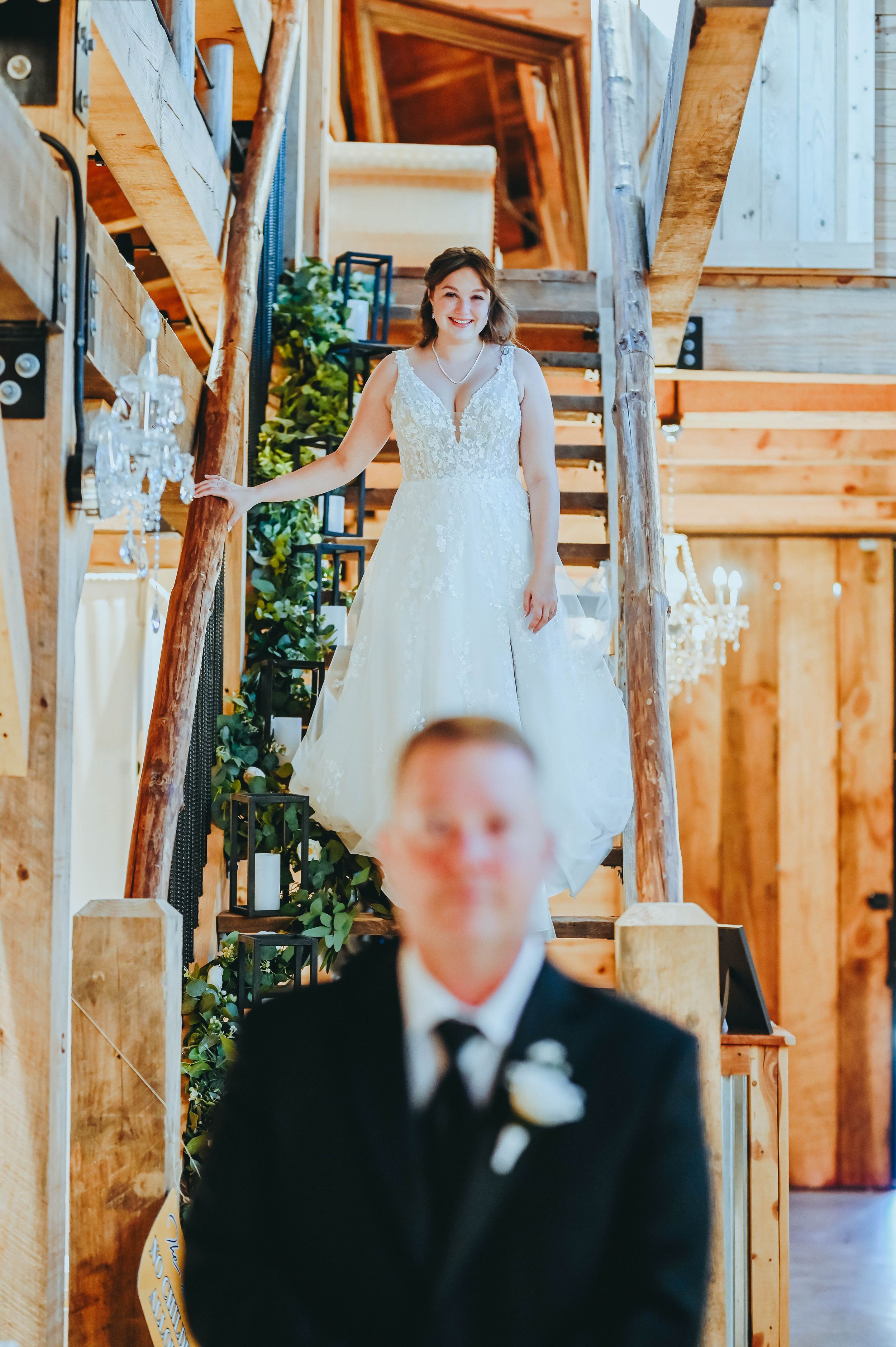 Heartfelt first look between bride and dad at the Barn at King Hill Farm, a cherished moment.