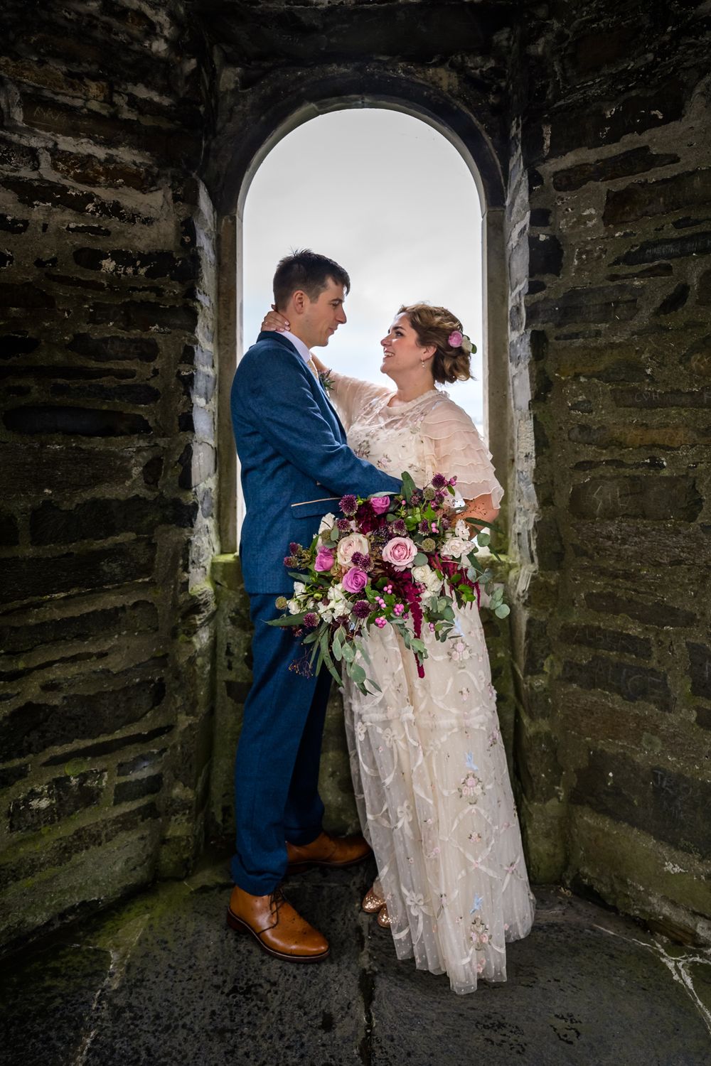 Bride and groom inside the Heroes Temple at Storrs Hall