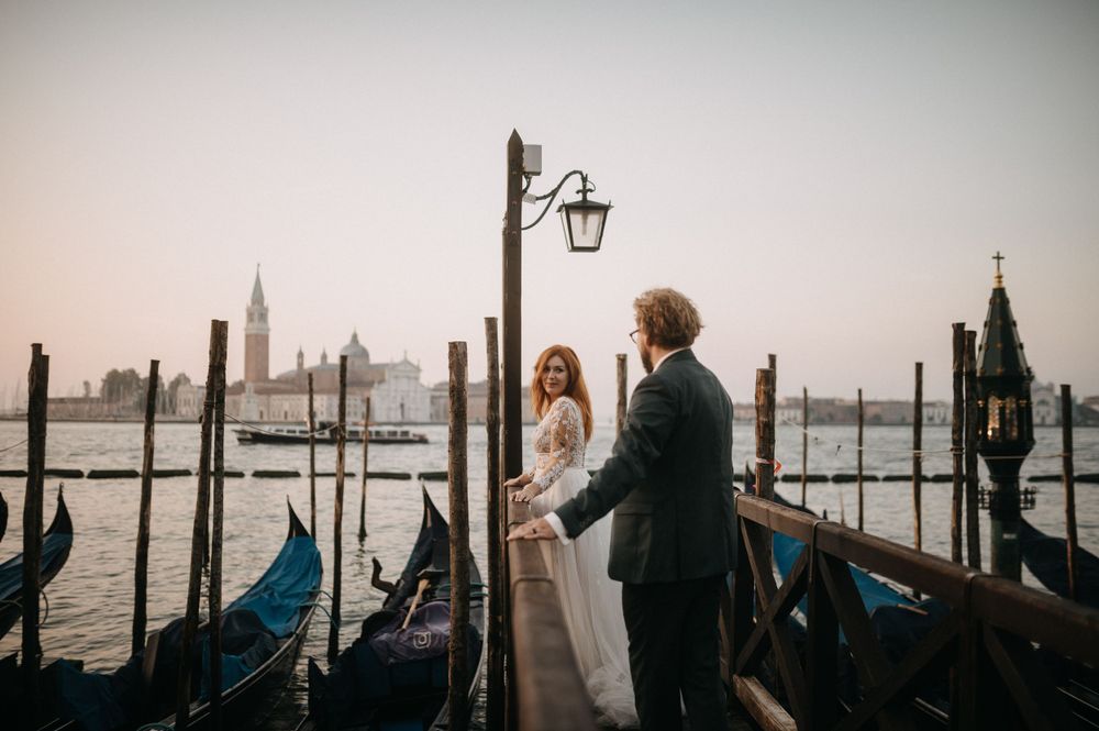 Romantic Venice wedding photos with traditional gondolas and lagoon views.