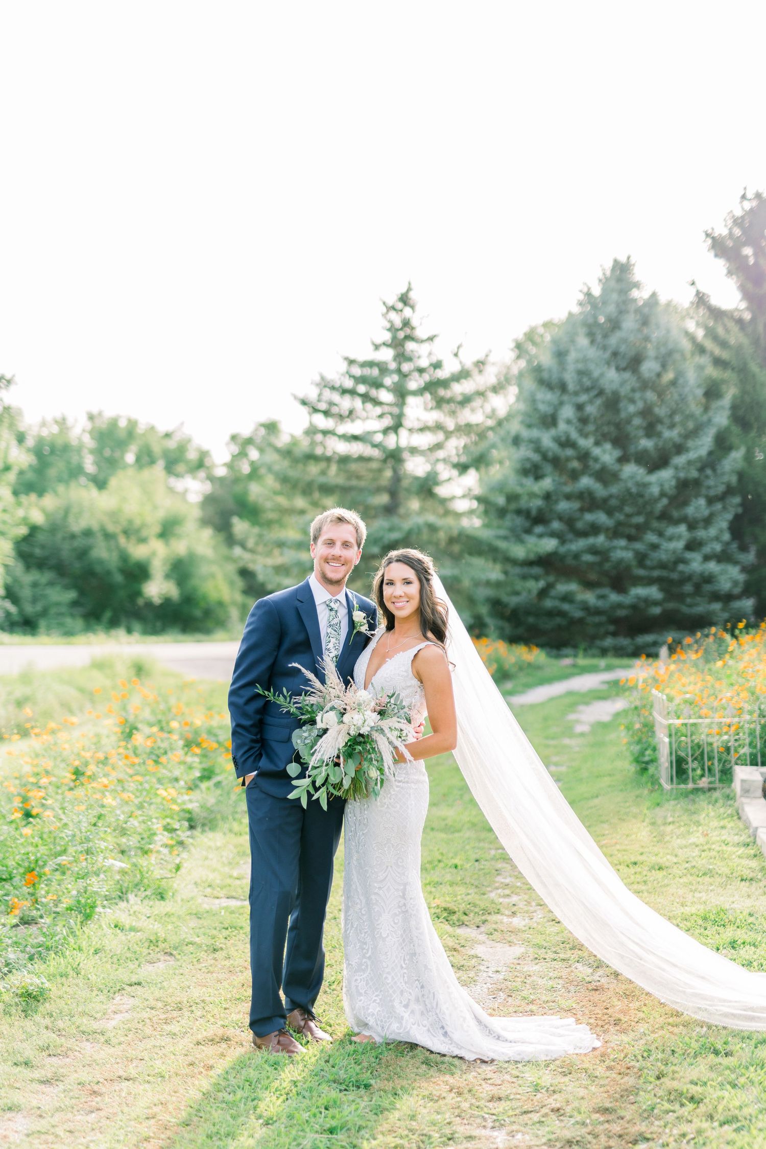 Vineyard photos with white willow events at Prairie Moon Winery wedding in Ames, Iowa