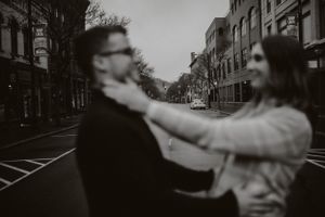 couple out of focus in the corning gaffer district in new york