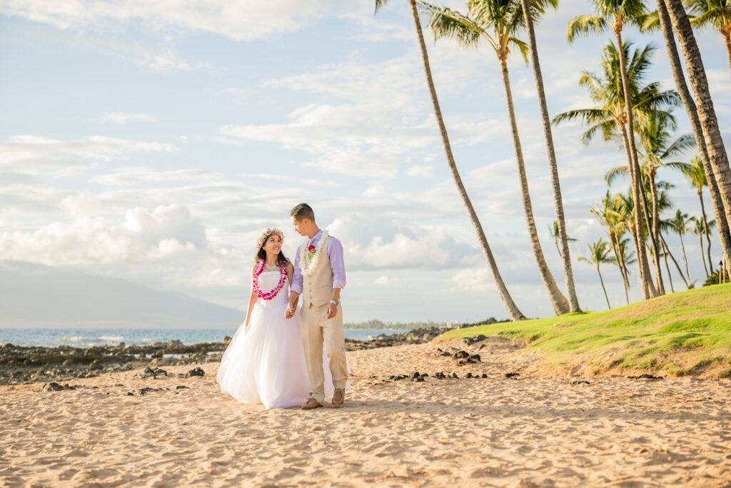 bride and groom beach walk