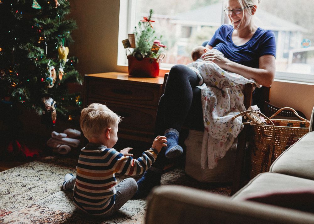 Fun family documentary newborn session Seattle