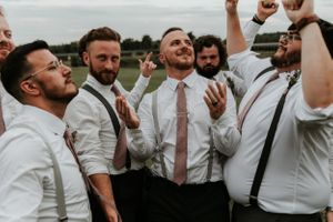 Finger Lakes Groomsmen and groom dancing