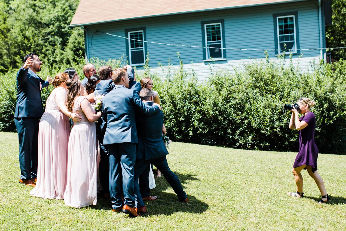 Rachel McIntyre with Kharis Photography behind the scenes group photo