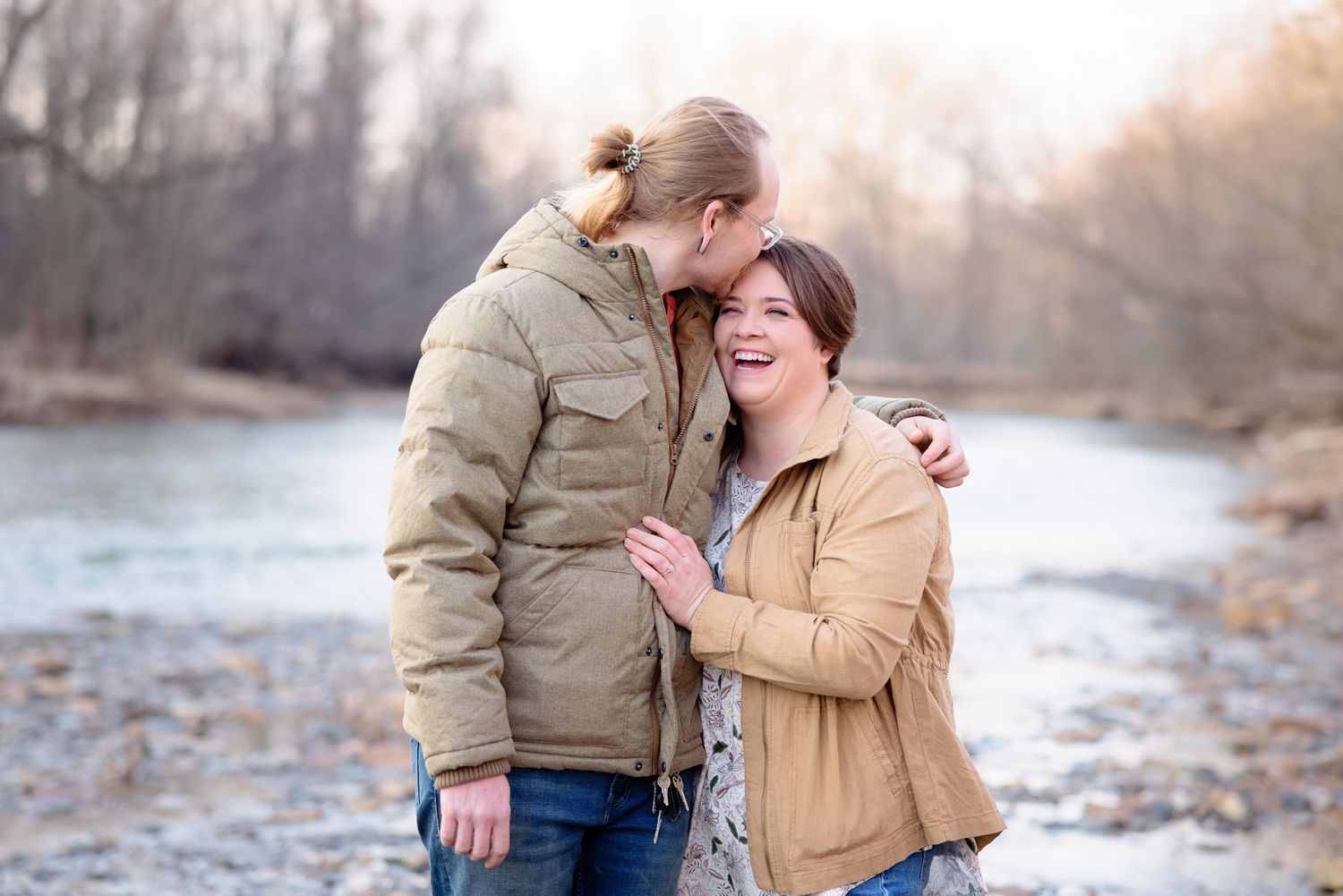 Couple Laughing During Engagement Photo Session at Mill Hollow Bacon Woods Park in Vermilion, Ohio