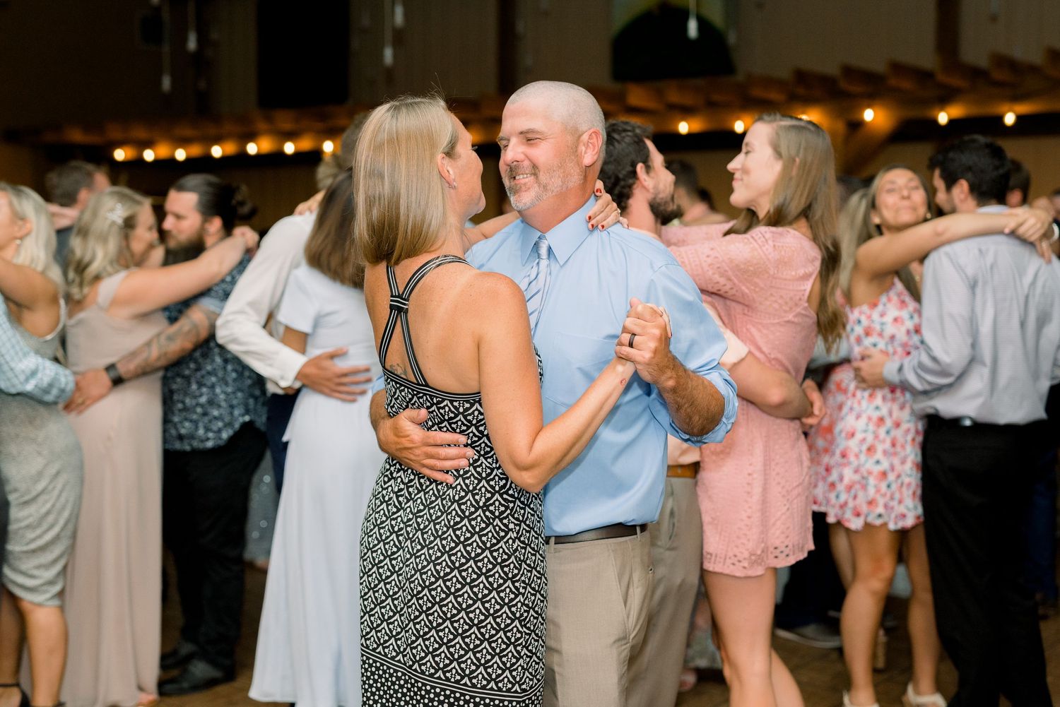 Vineyard photos with white willow events at Prairie Moon Winery wedding in Ames, Iowa