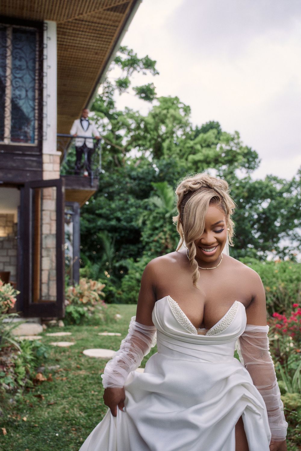 Romantic outdoor bridal photo session showing elegant white dress and soft natural lighting in a Jamaica Wedding Photographer