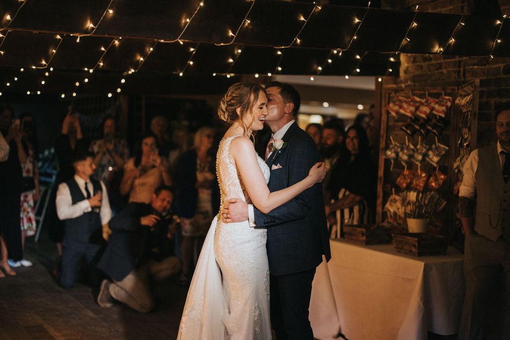 A romantic first dance between newlyweds at Hall Farm - image captured by Grimsby photographers.