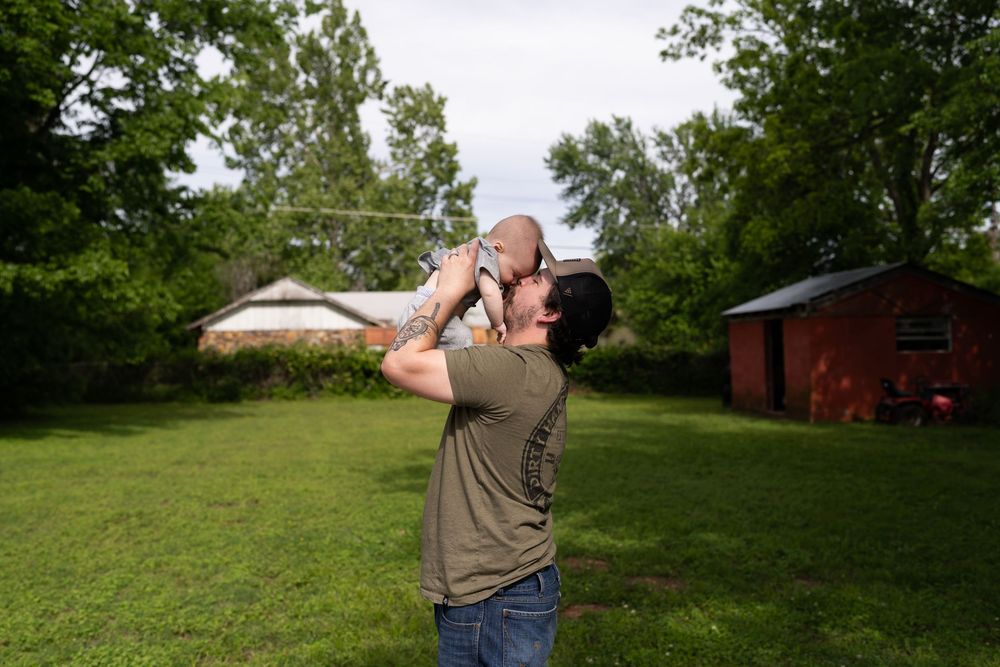 Dad plays with baby. Tulsa Family Photography