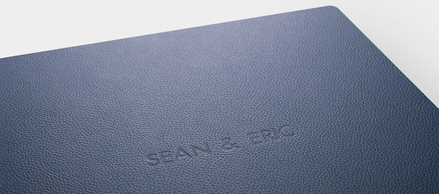 Several separate metallic surfaces or plates are shown at different angles under lighting.