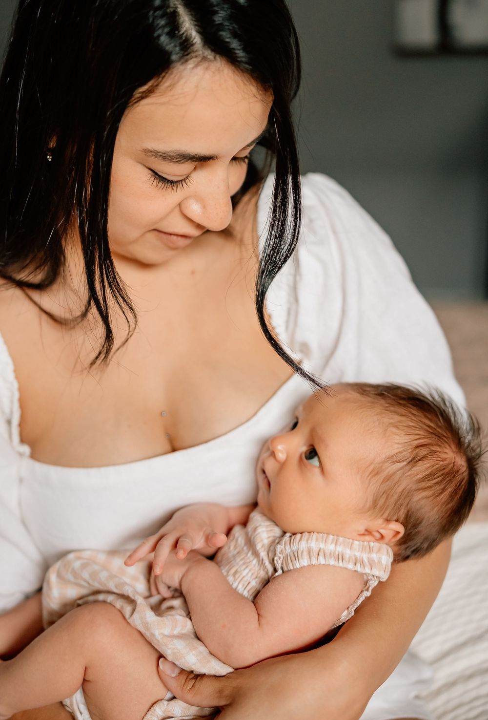 Collection of tender breastfeeding moments captured in soft natural light.