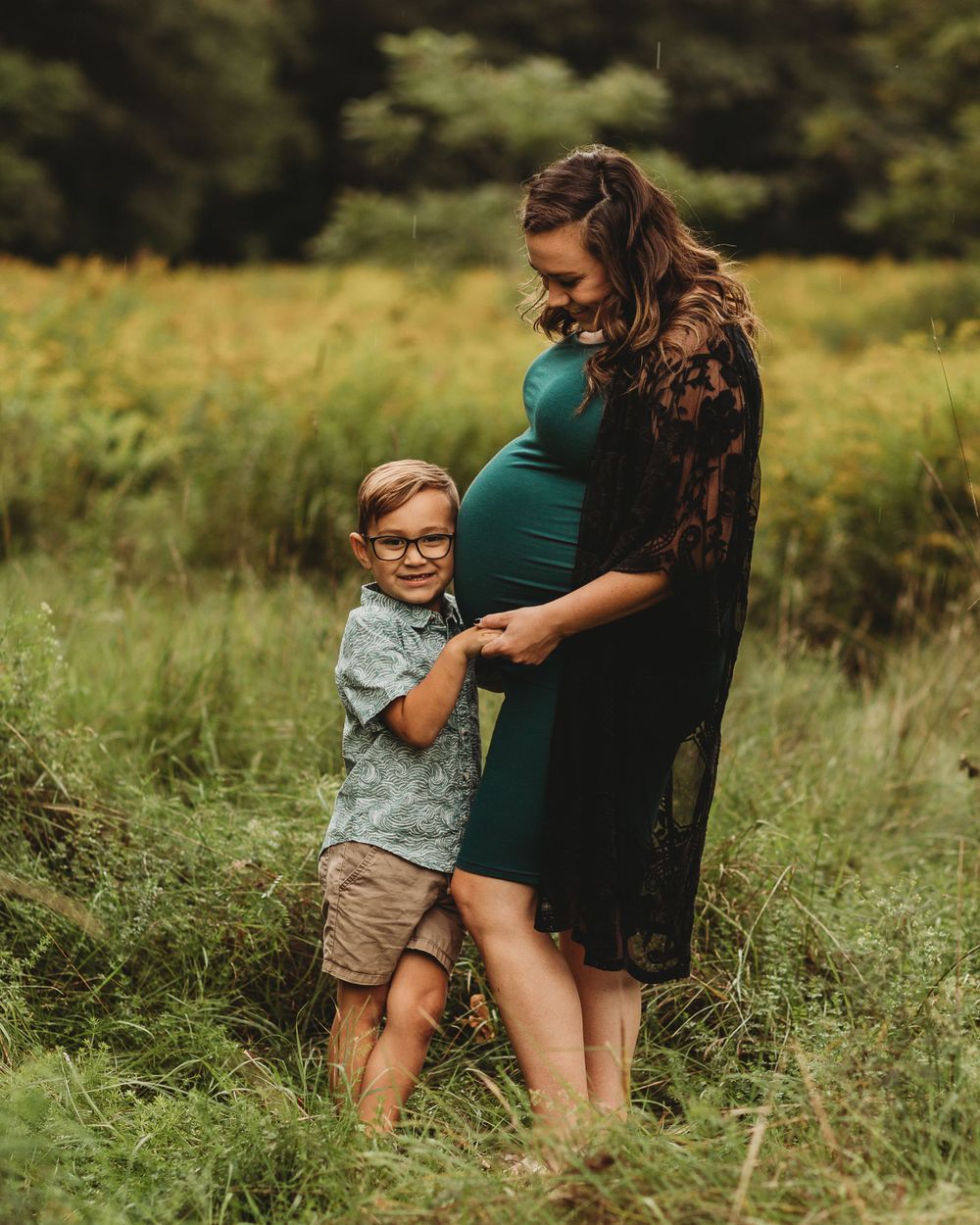 Professional maternity photo with big brother
