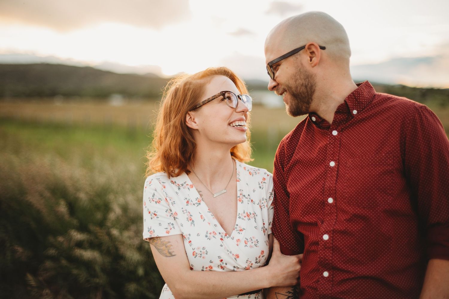 A couple gets their photos taken during their engagement session at Reservoir Ridge Natural Area in Fort Collins.