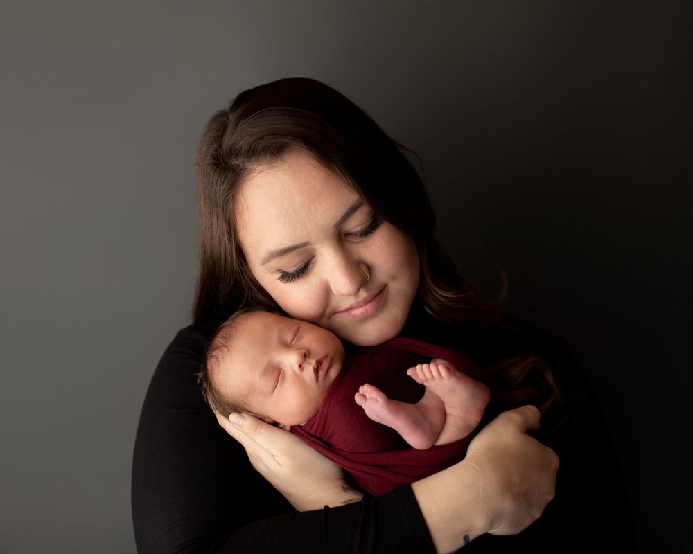 Professional newborn photo with mom