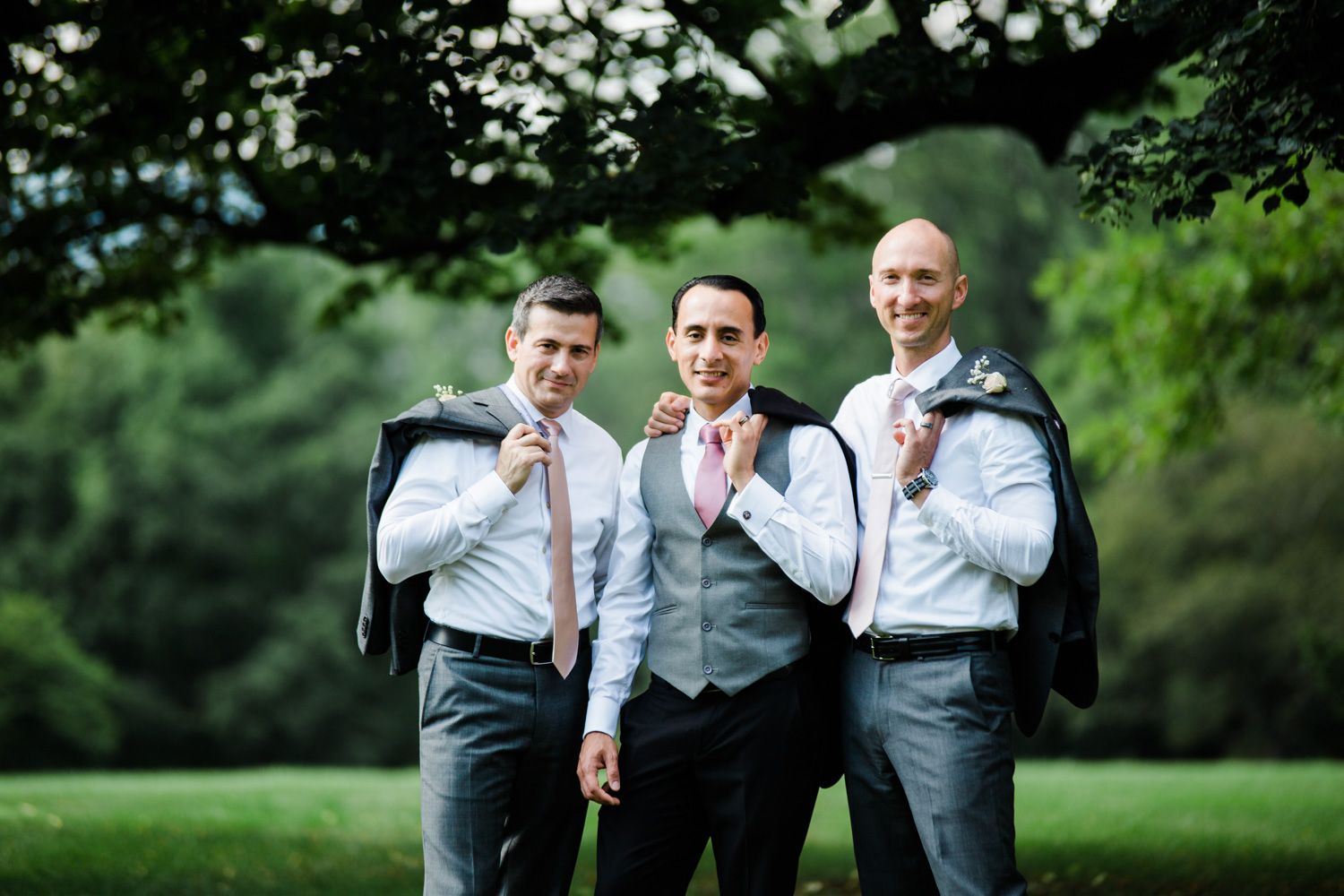 Groom and groomsmen in casual pose at Skylands Manor in New Jersey