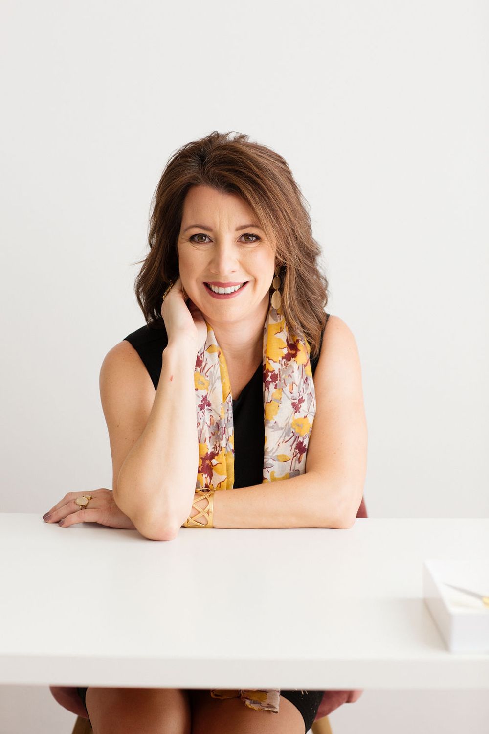 Personal brand portrait of Virtual Assistant in yellow scarf