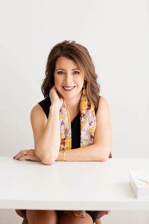 Personal brand portrait of Virtual Assistant in yellow scarf