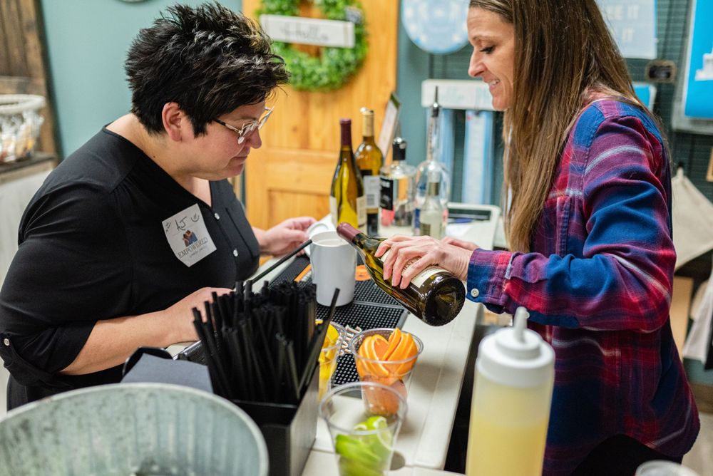 Woman pouring alchohol