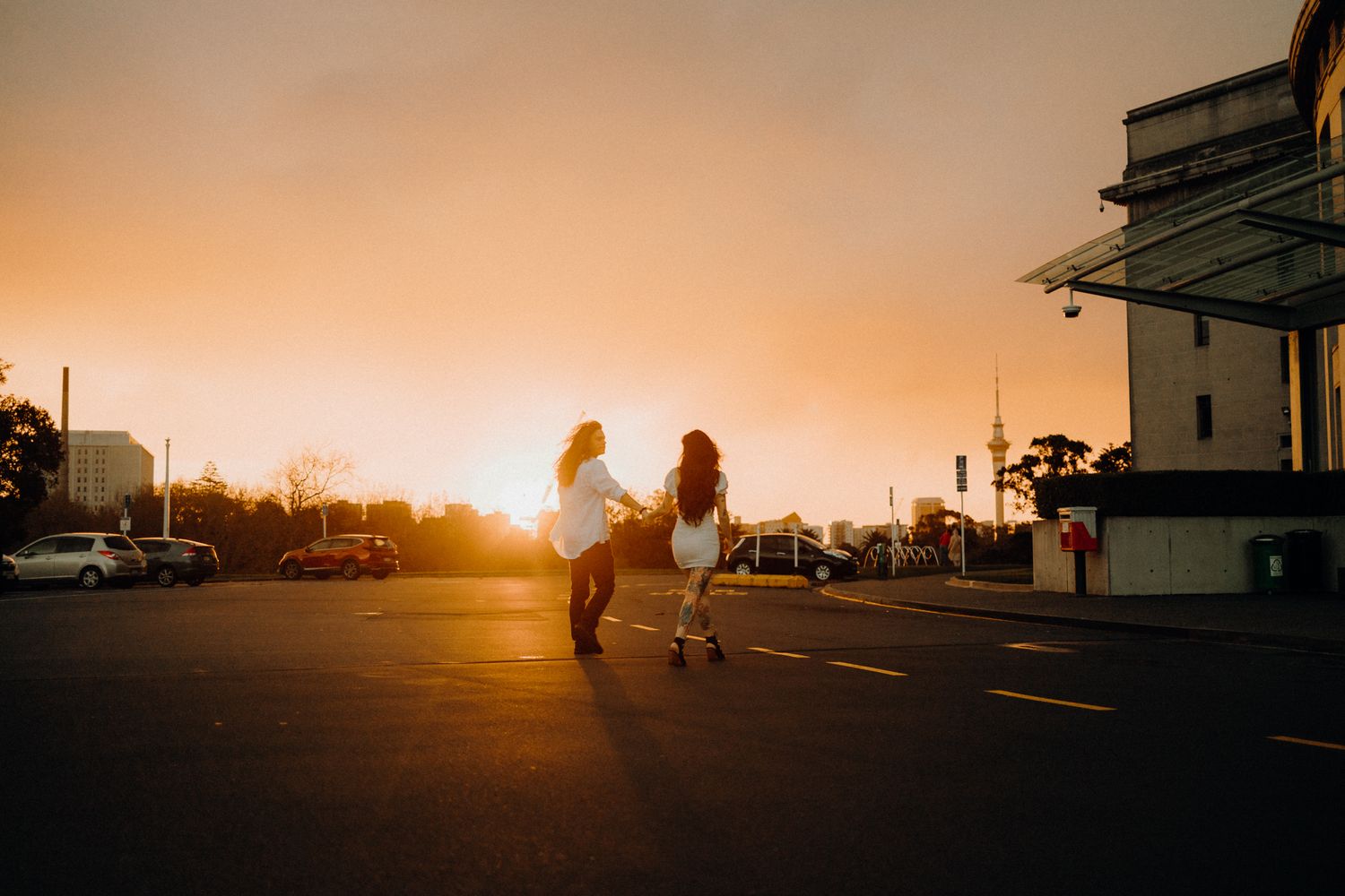 Lovers in their engagement shoot at sunset in Auckland Museum with Apertured Media-Auckland Wedding Photographer