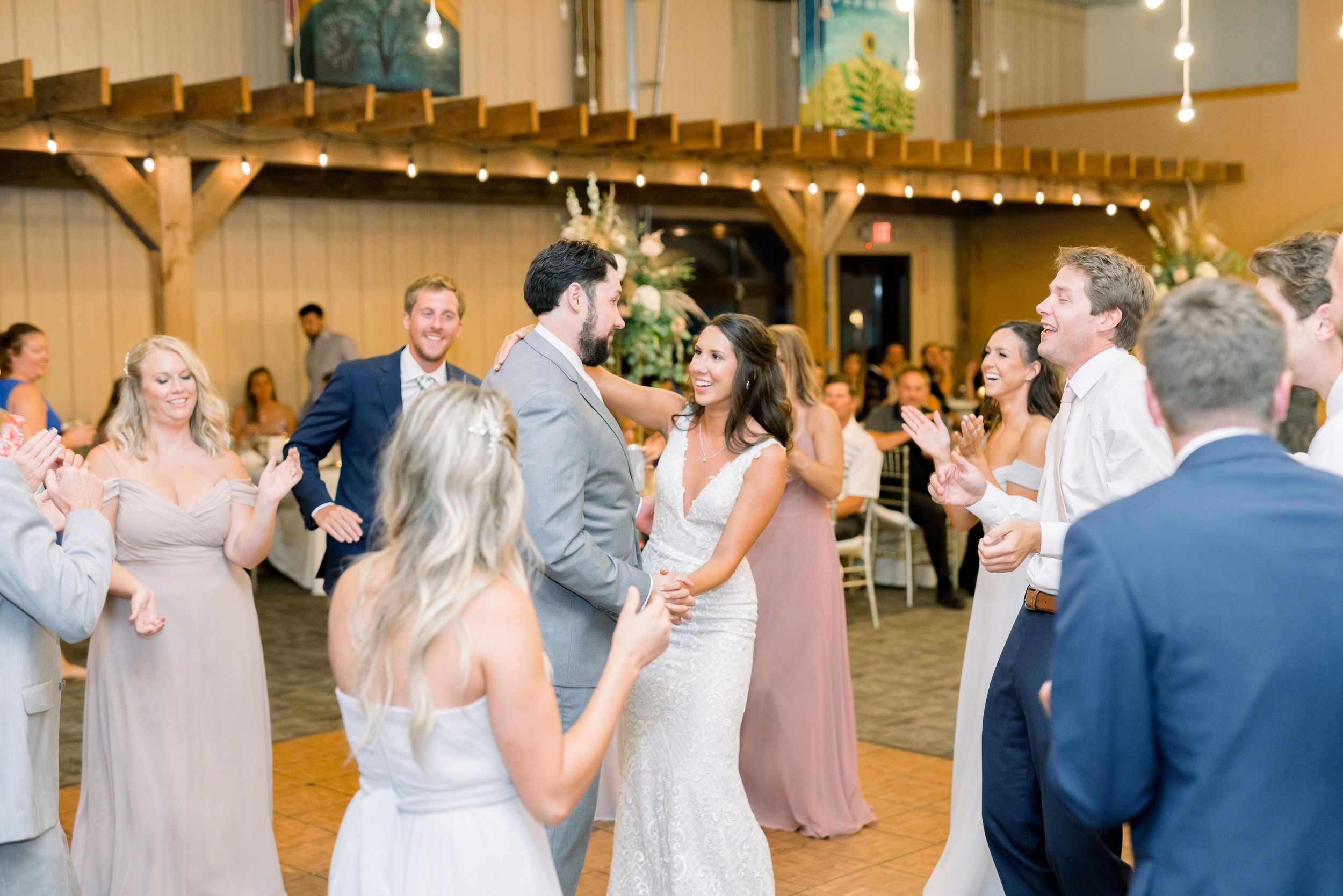 Vineyard photos with white willow events at Prairie Moon Winery wedding in Ames, Iowa