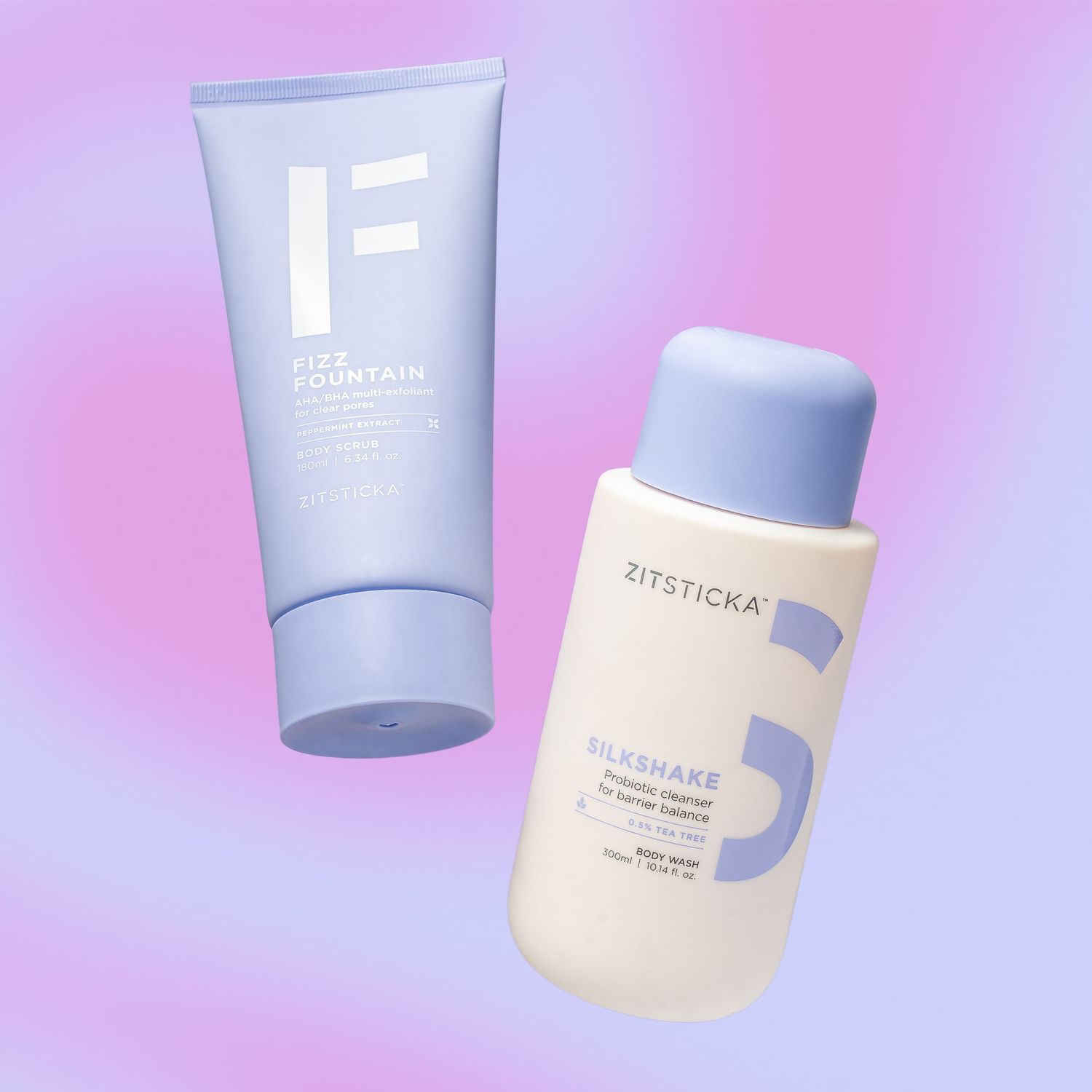 Two skincare tubes in lavender and white on pink gradient background.