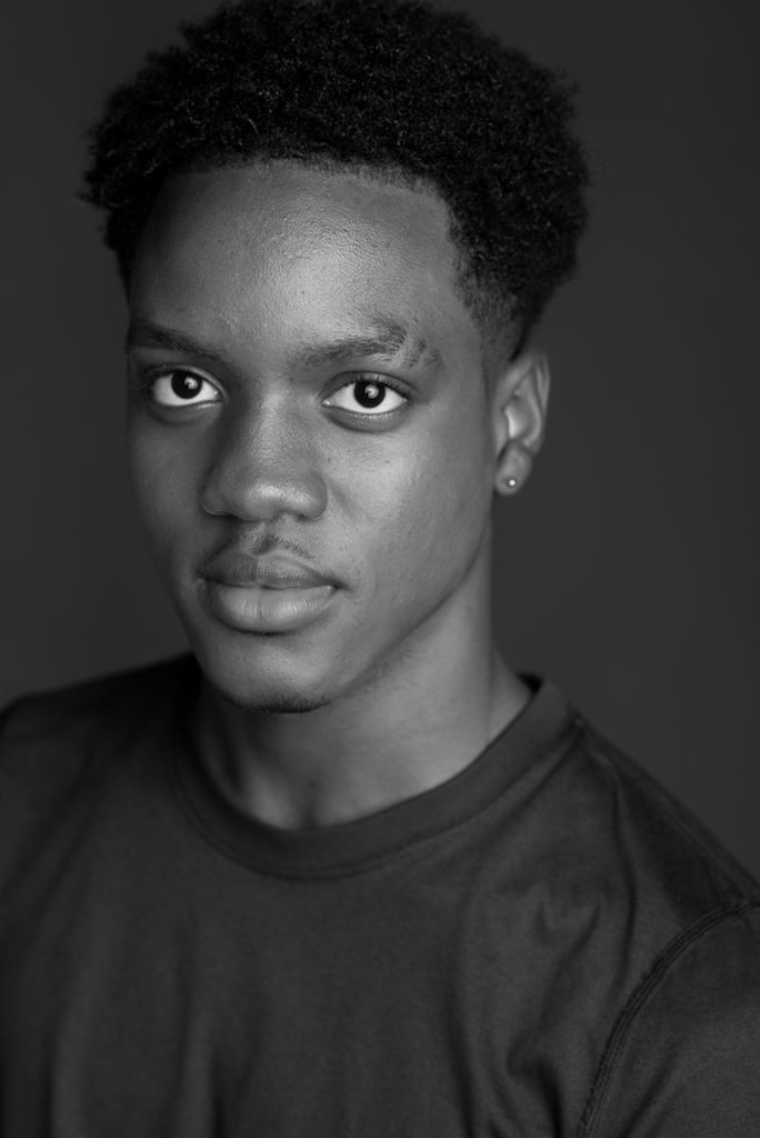 Dancer Chad Montplaisir headshot against grey background in Caribbean Photographer by Logan C Thomas' studio Barbados