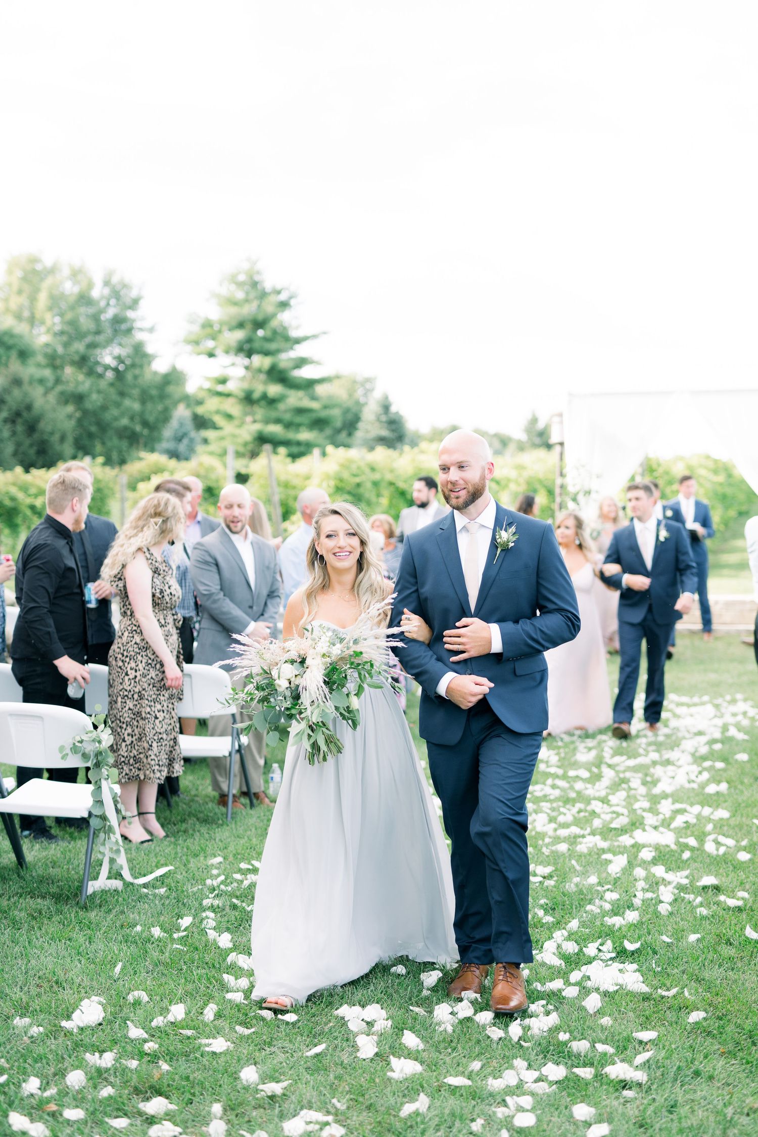 Vineyard photos with white willow events at Prairie Moon Winery wedding in Ames, Iowa