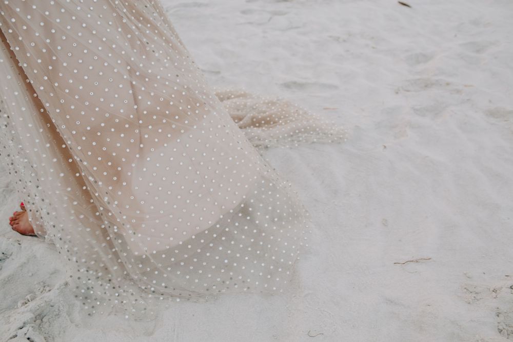 bride's wet dress from the ocean