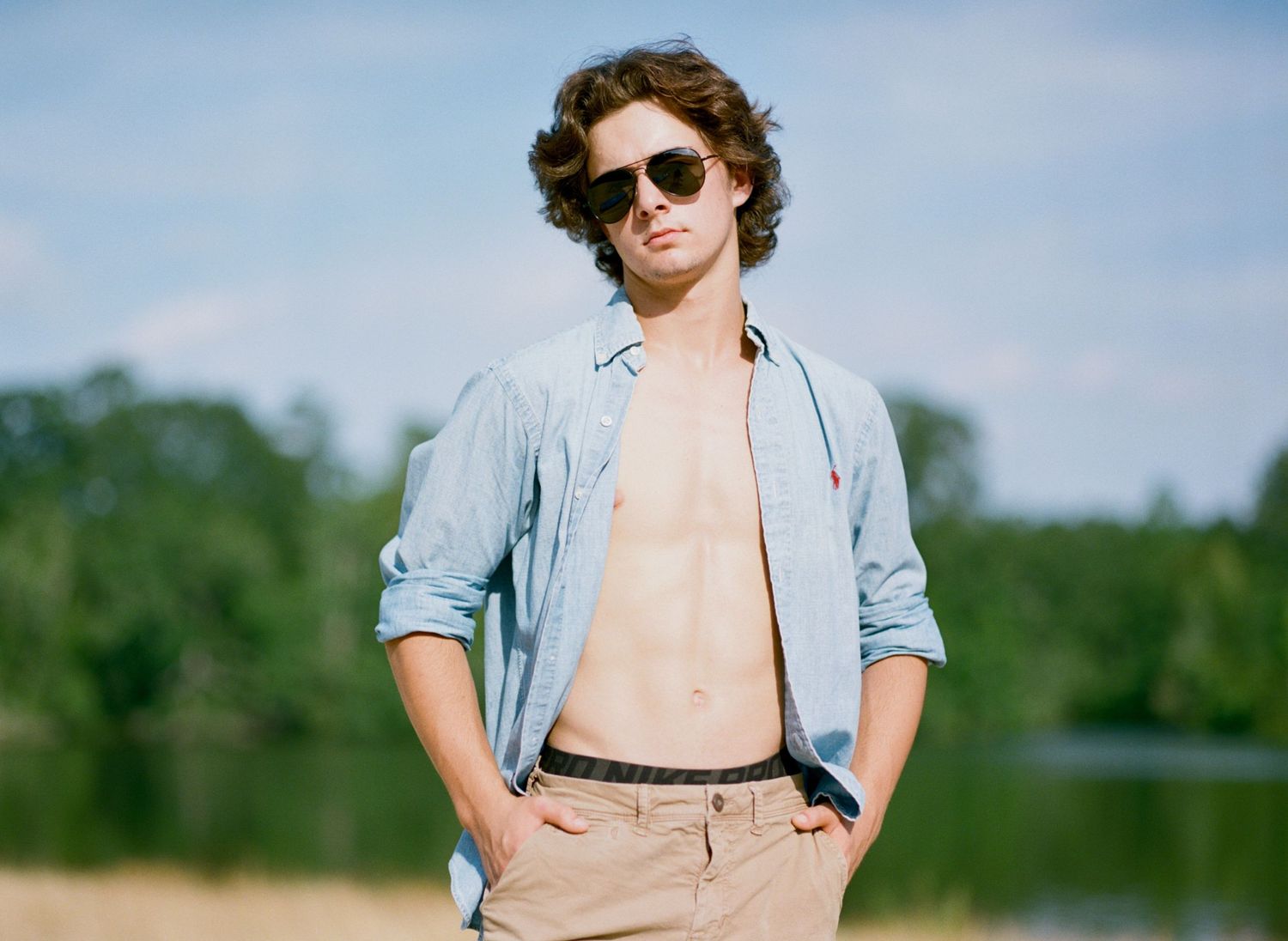 A Bowling Green class of 2020 senior poses for senior pictures at his lake house near Franklinton
