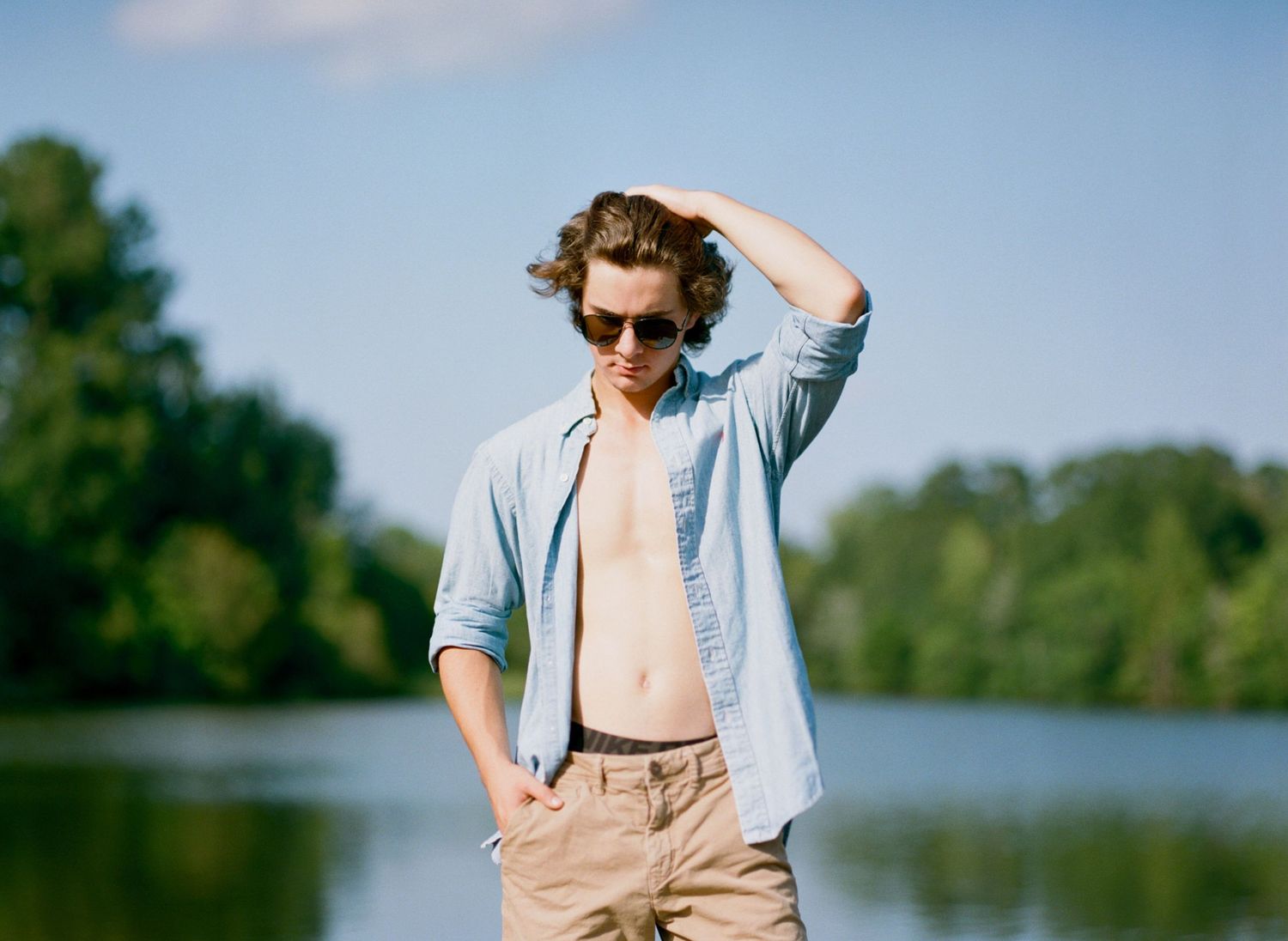A Bowling Green class of 2020 senior poses for senior pictures at his lake house near Franklinton