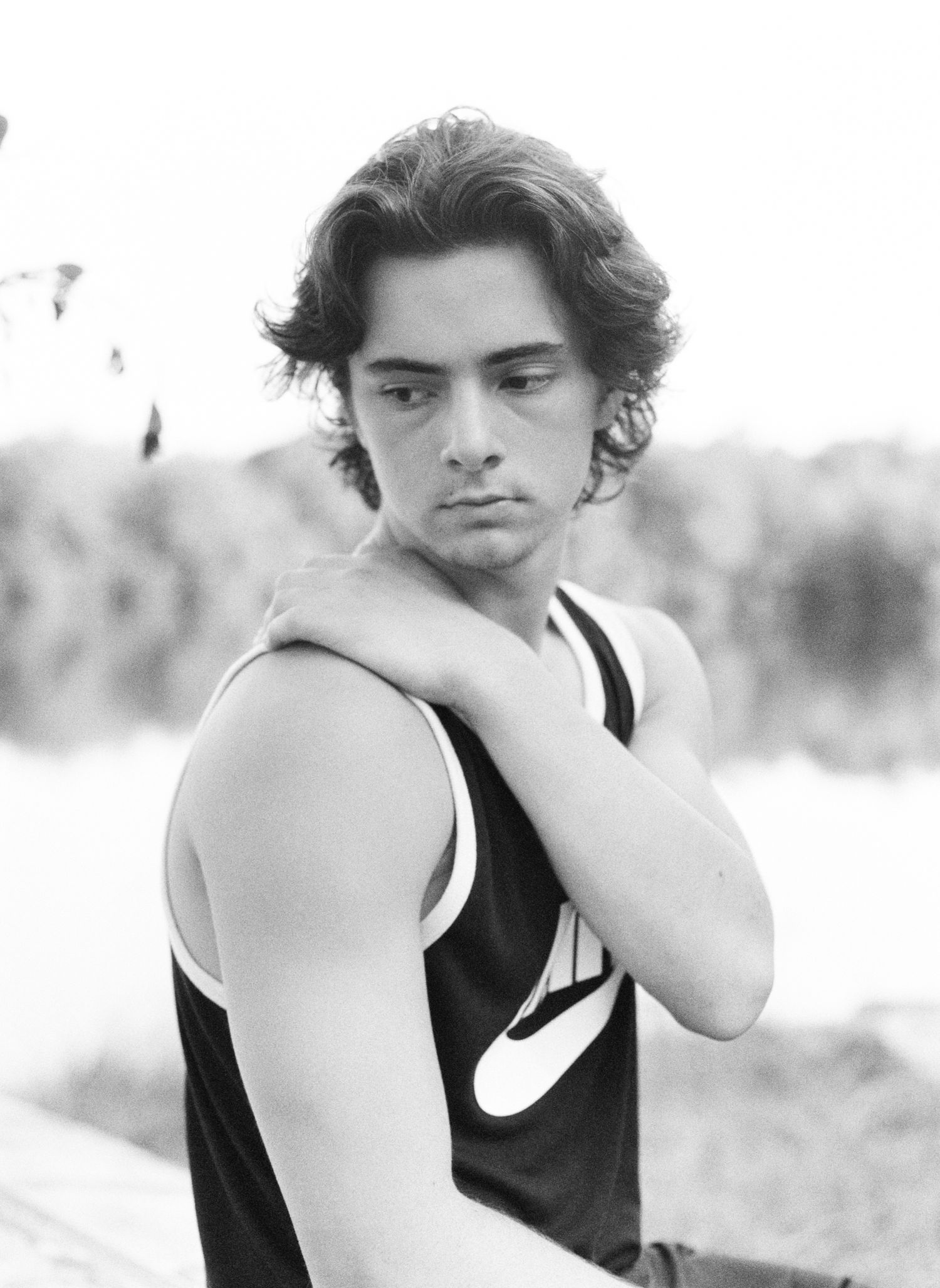 A Bowling Green class of 2020 senior poses for senior pictures at his lake house near Franklinton