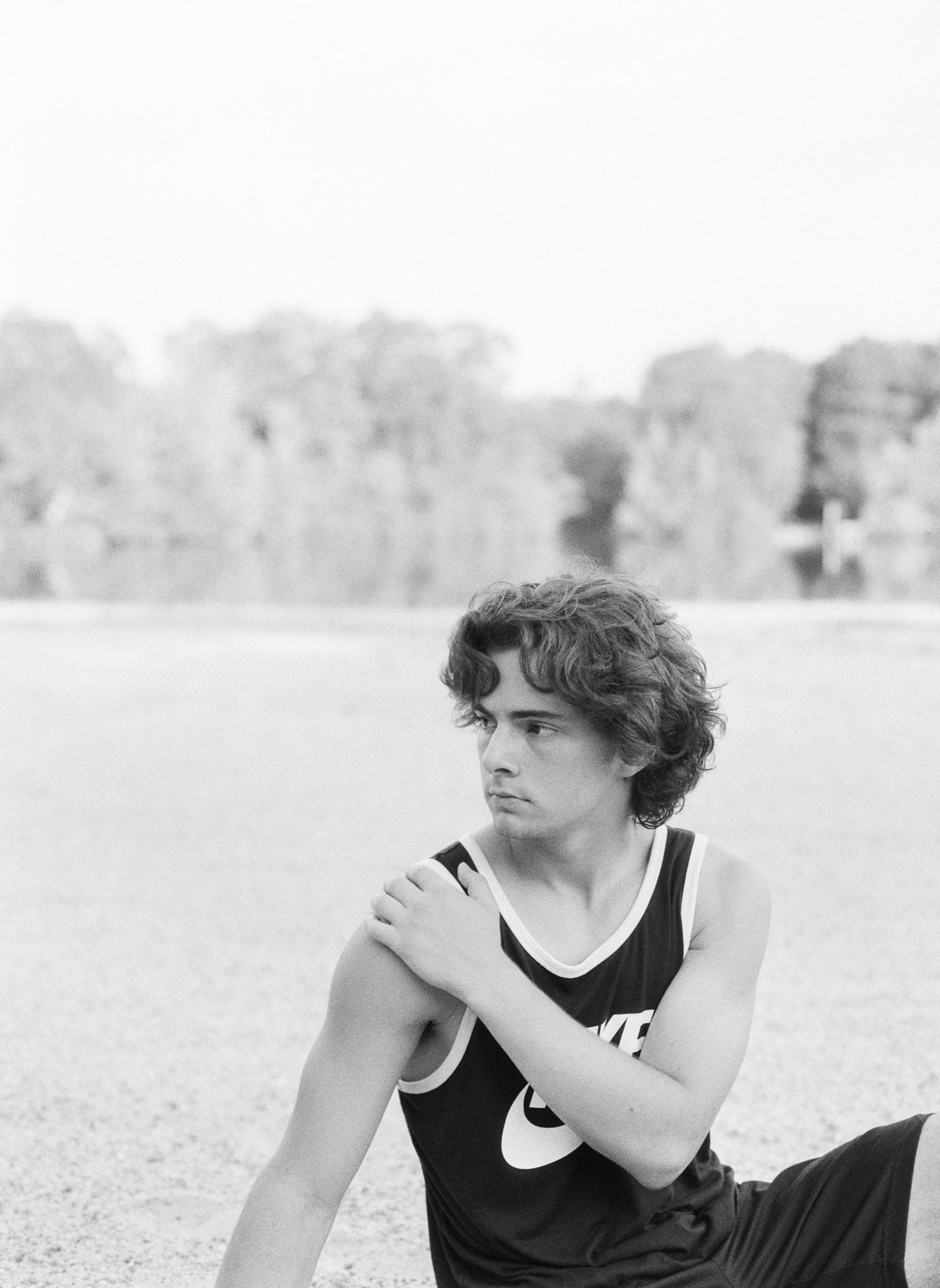 A Bowling Green class of 2020 senior poses for senior pictures at his lake house near Franklinton