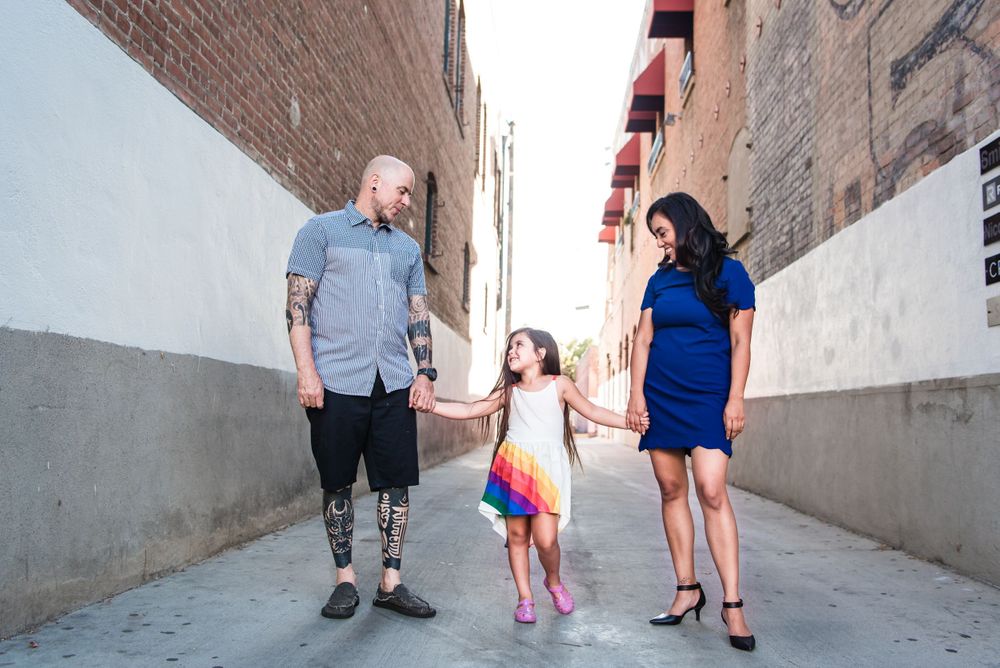 Photo of a family standing in an alley in Orange, CA