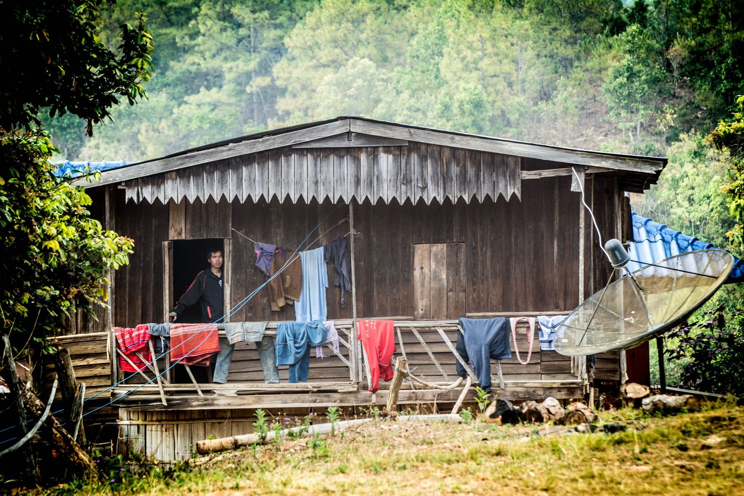 Early morning washing at Akha Tribe house in Mountains of Northern Thailand