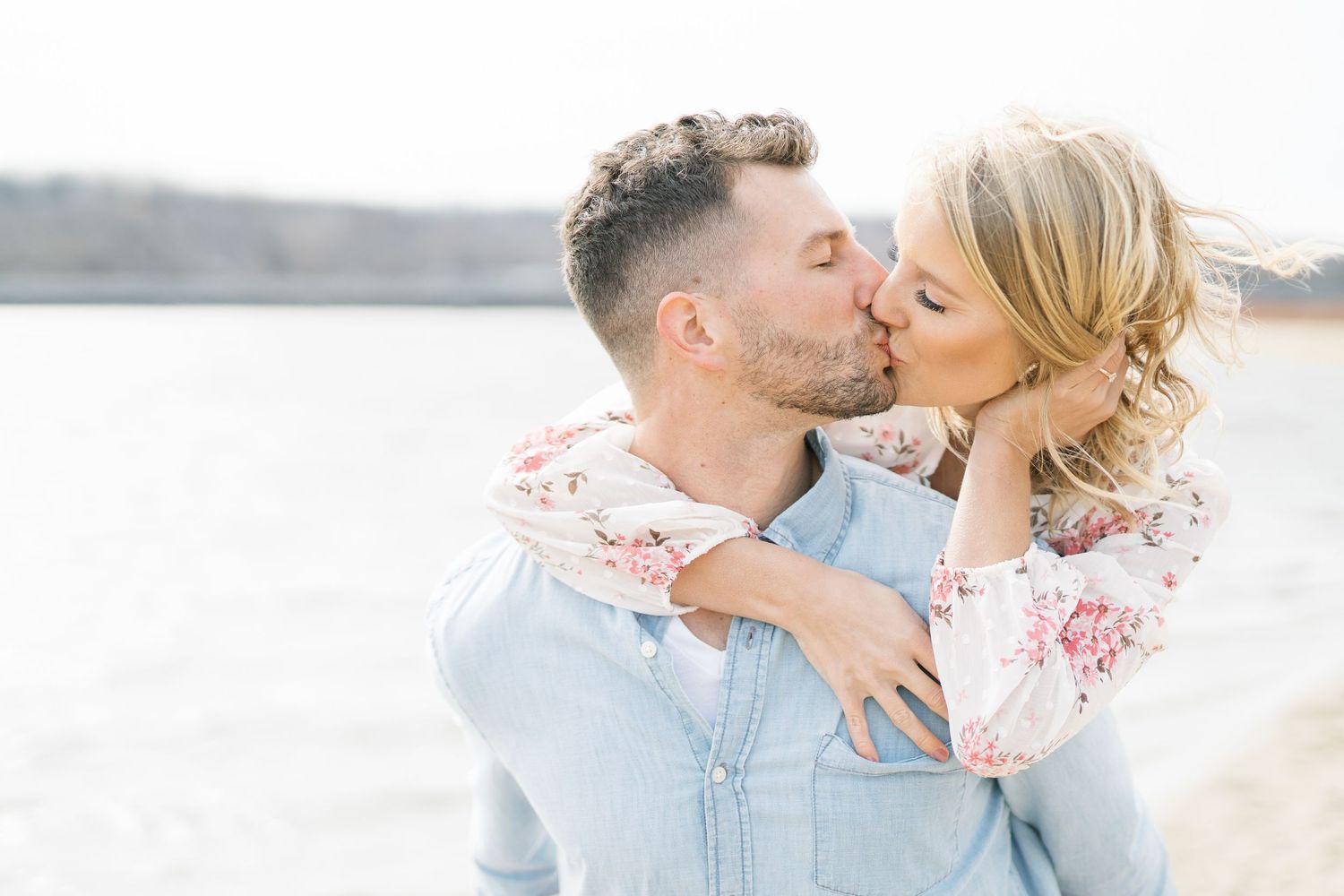 Light and airy film lakeside dock engagement session at Gray's Lake in Des Moines, Iowa