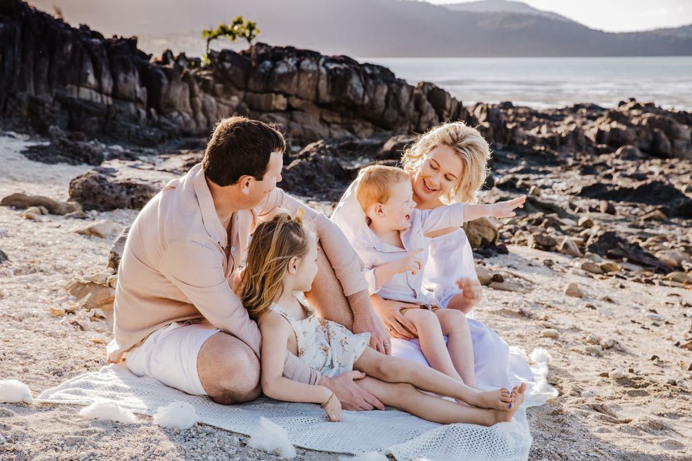 family beach photoshoot in Airlie beach North Queensland