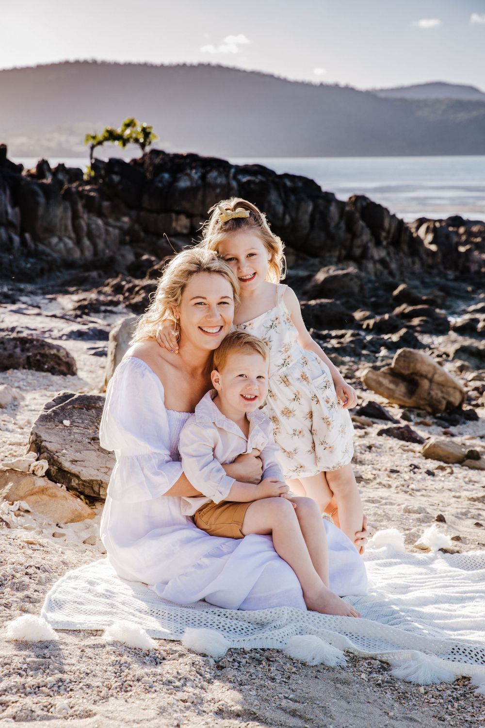 family beach photoshoot in Airlie beach North Queensland