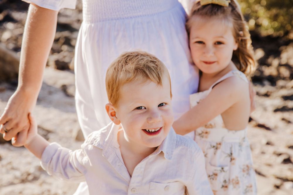 family beach photoshoot in Airlie beach North Queensland