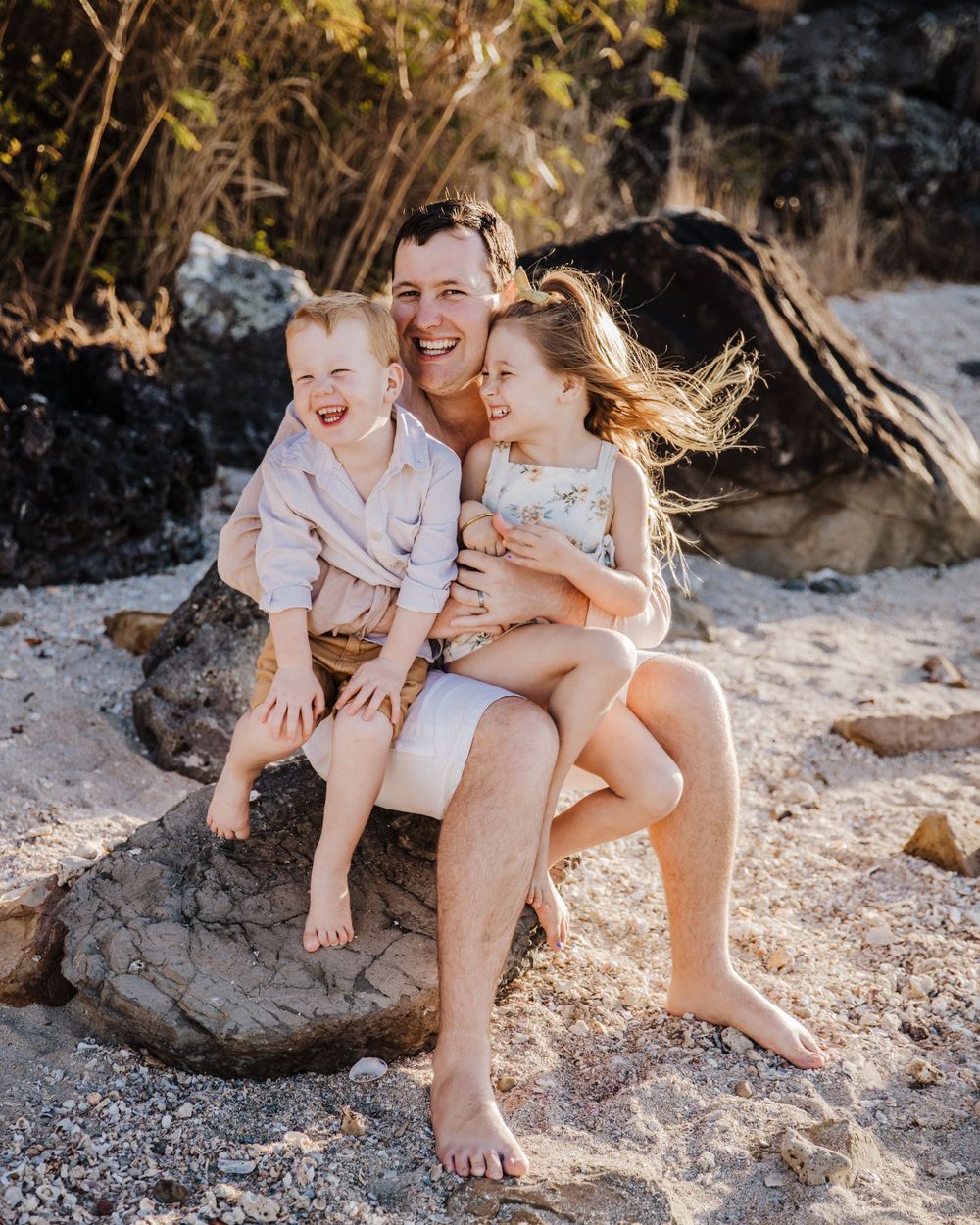 family beach photoshoot in Airlie beach North Queensland