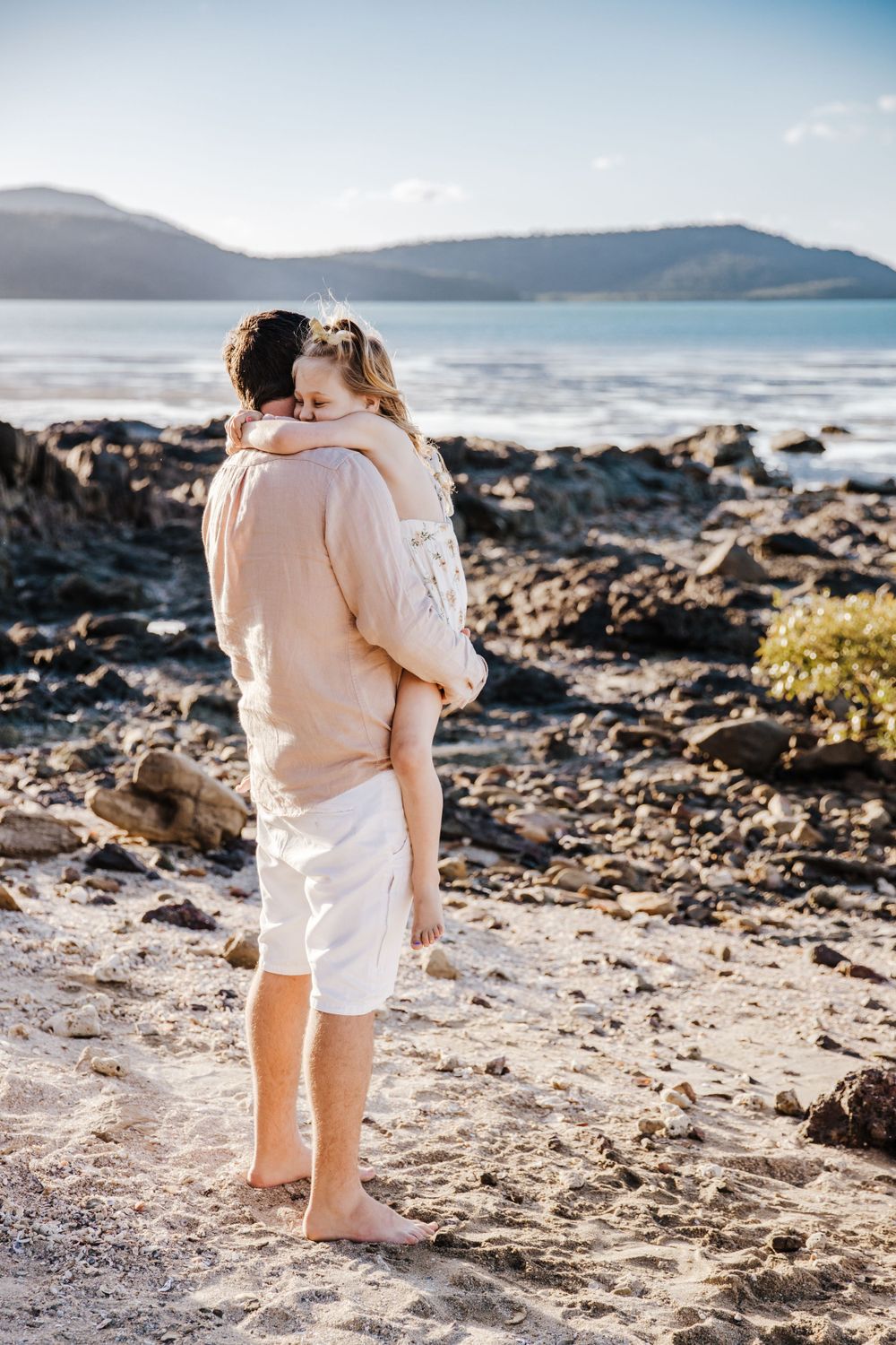family beach photoshoot in Airlie beach North Queensland