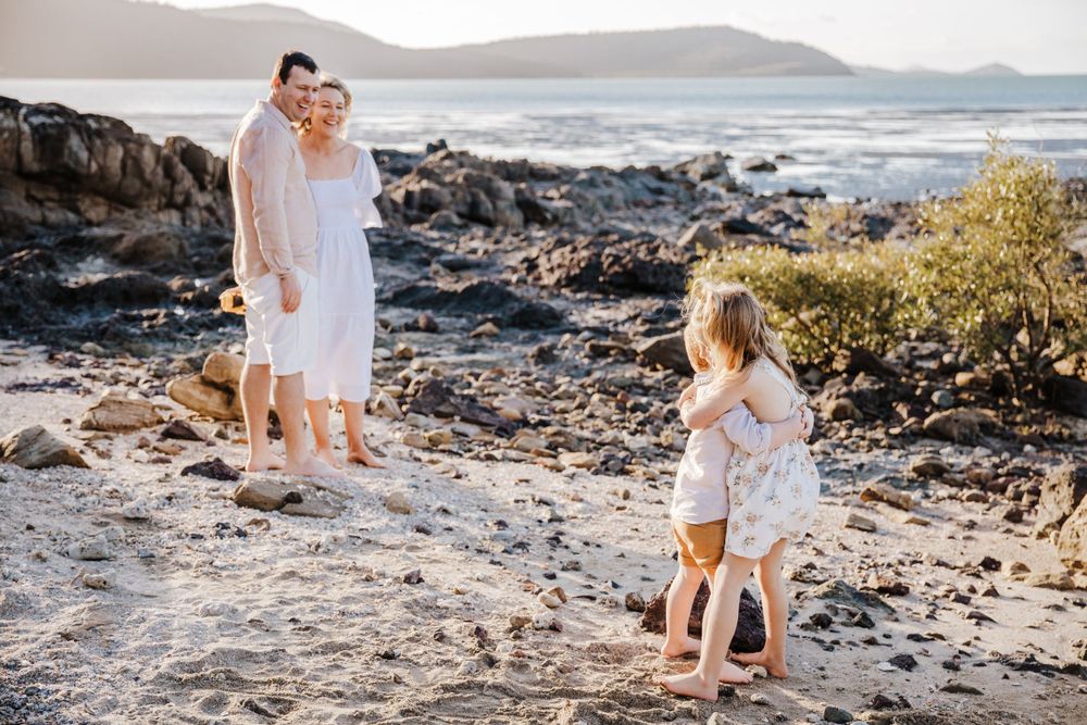 family beach photoshoot in Airlie beach North Queensland
