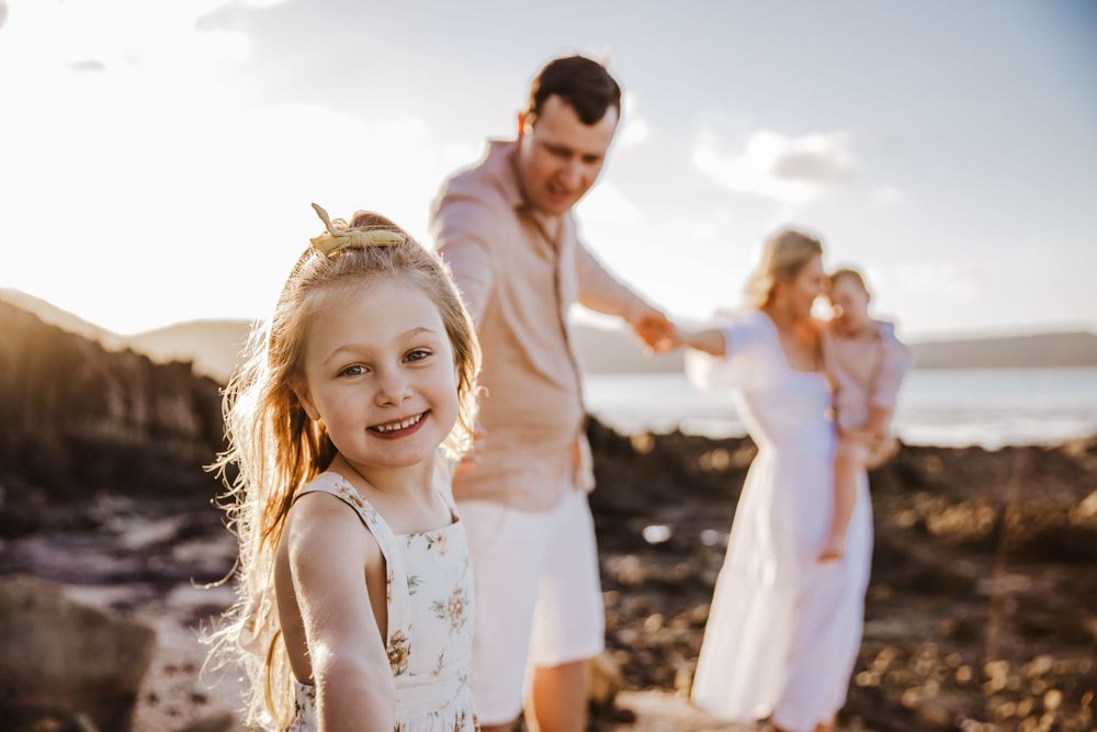 family beach photoshoot in Airlie beach North Queensland
