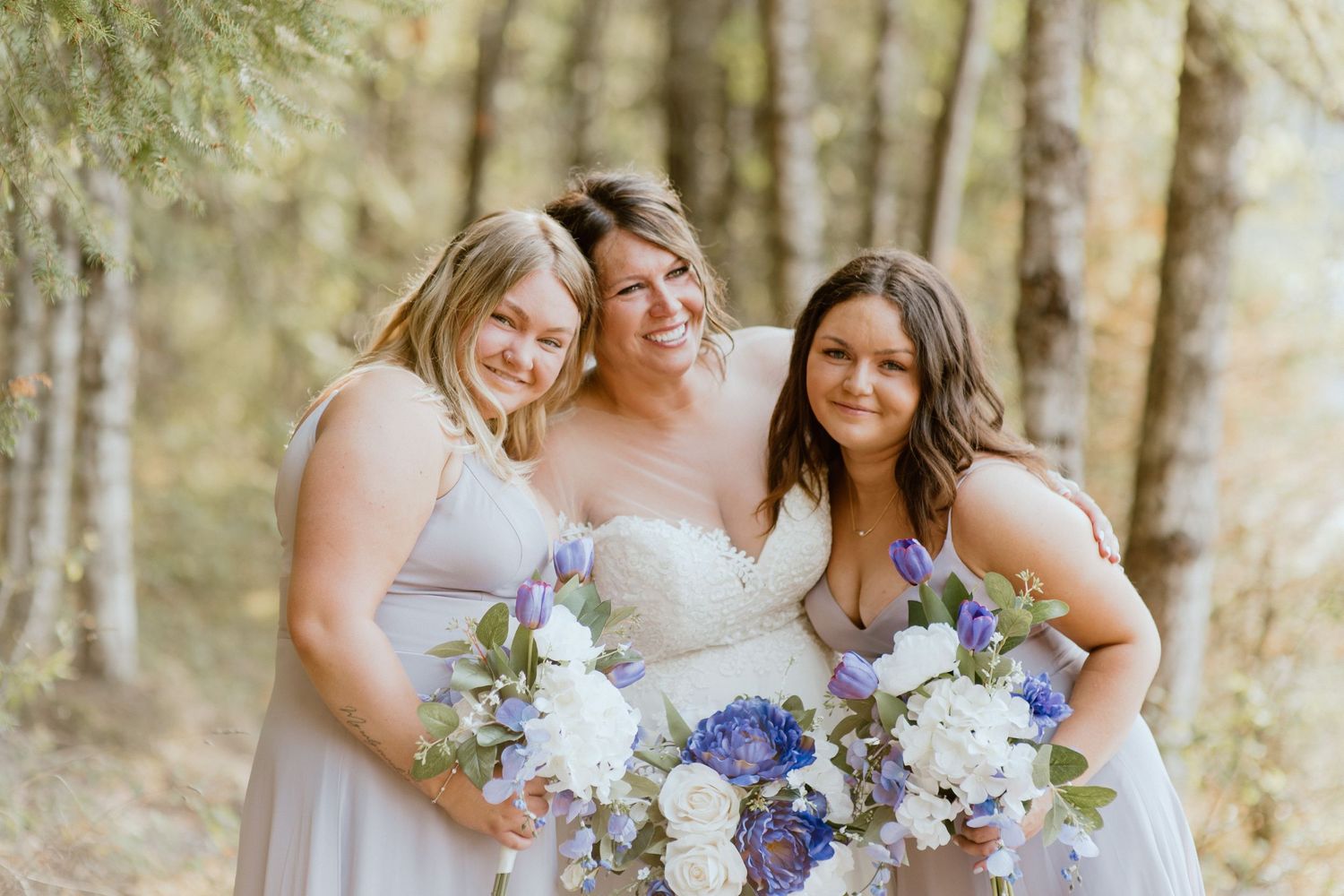 bride-bridesmaids-hugging-okanagan