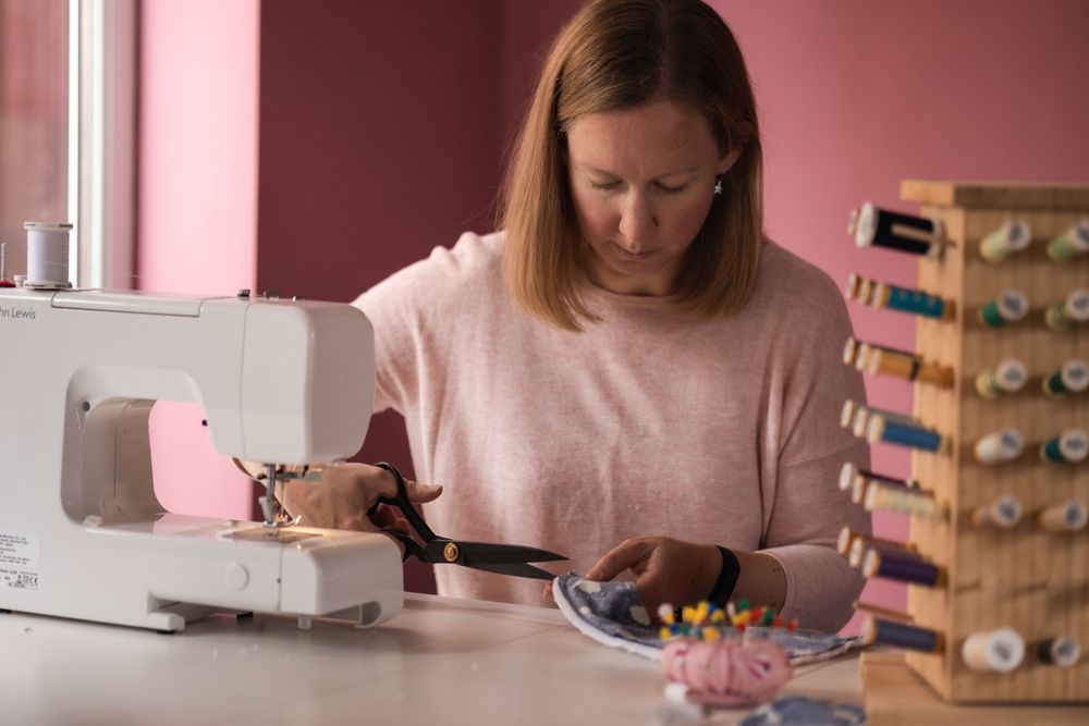 Behind the scenes of small business owner at work, in North London studio.