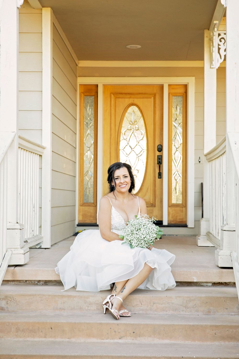 Bride on the steps at The Grace Maralyn Estate, Atascadero, California