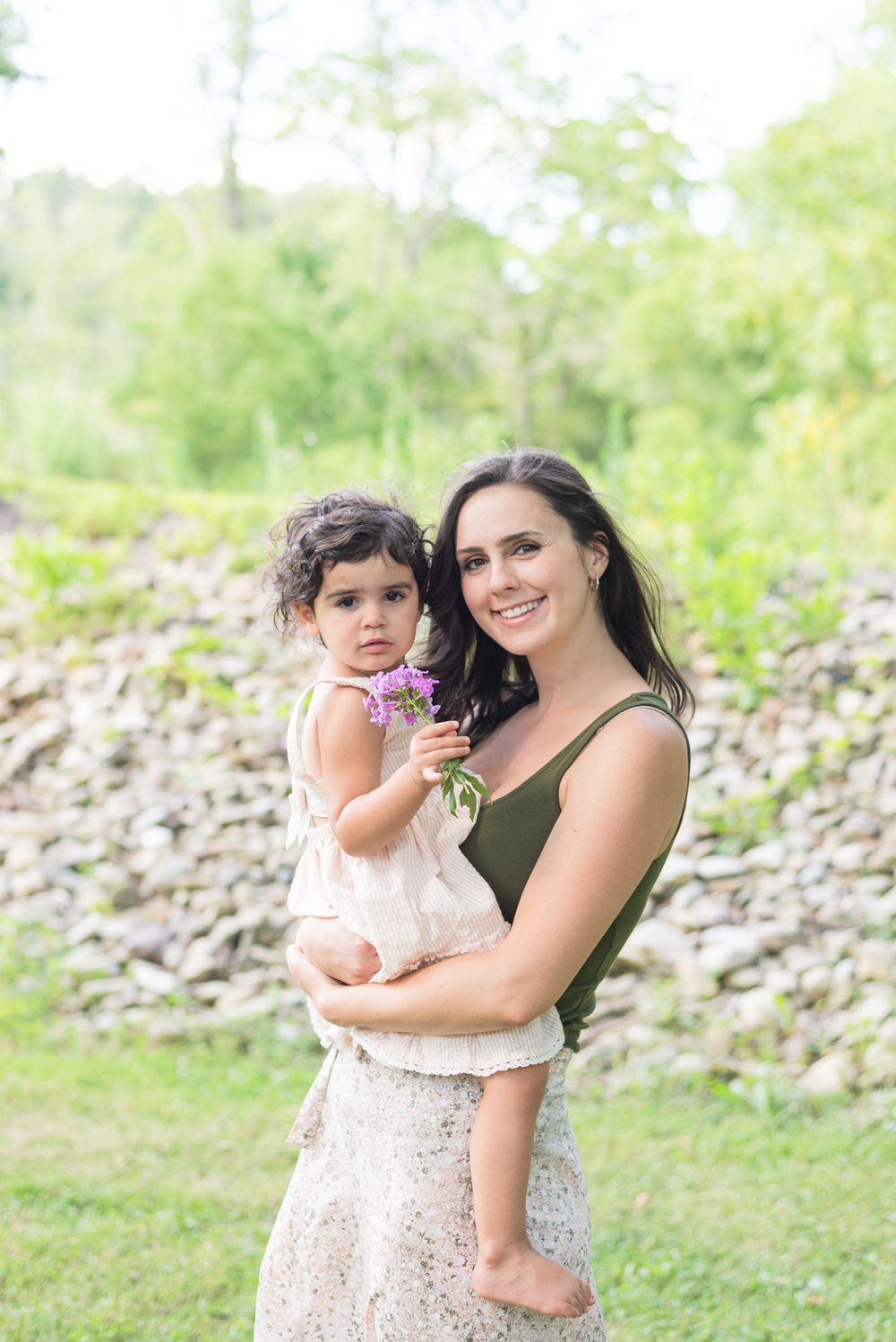 Mom holding toddler daughter at Emmerling Park in Cheswick Pennsylvania