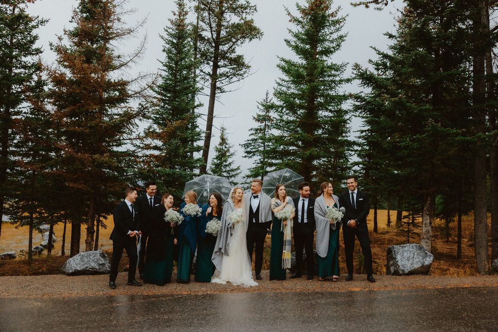 Emotional couple portrait in the Canadian Rockies with mountain backdrop | Calgary wedding photographers.
